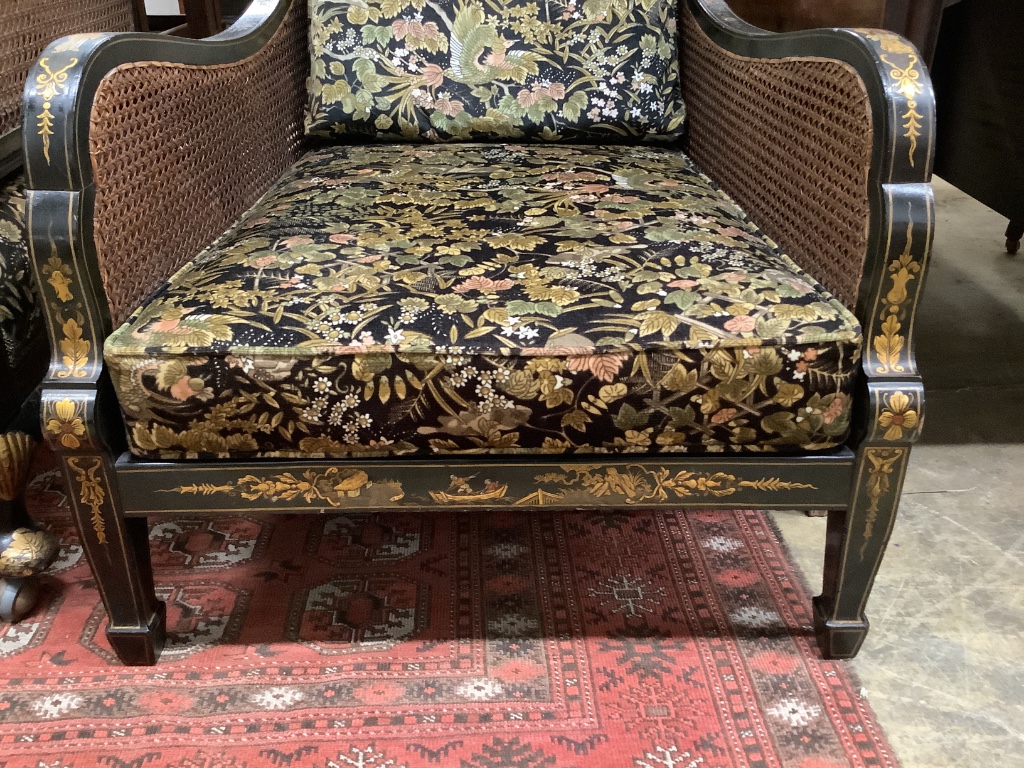 An early 20th century chinoiserie lacquer bergere armchair, width 70cm depth 85cm height 82cm